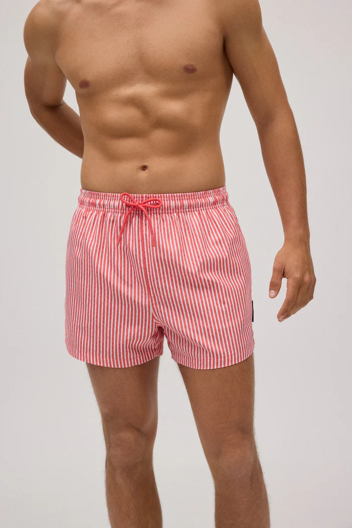 Green striped short swim trunks