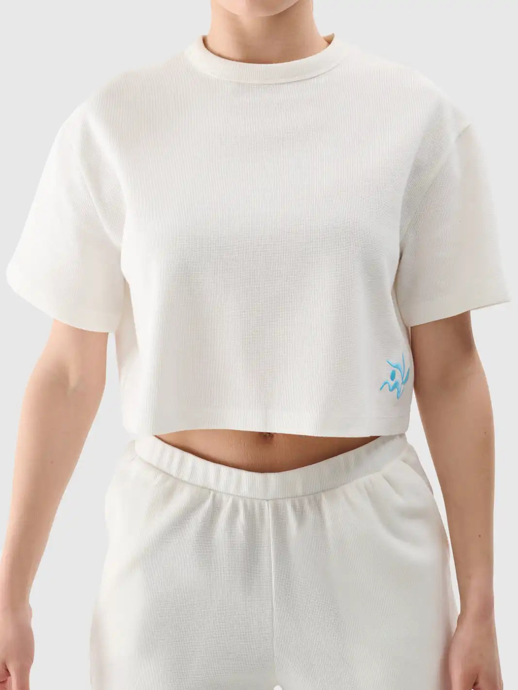 T-shirt court pour femme en maille gaufrée