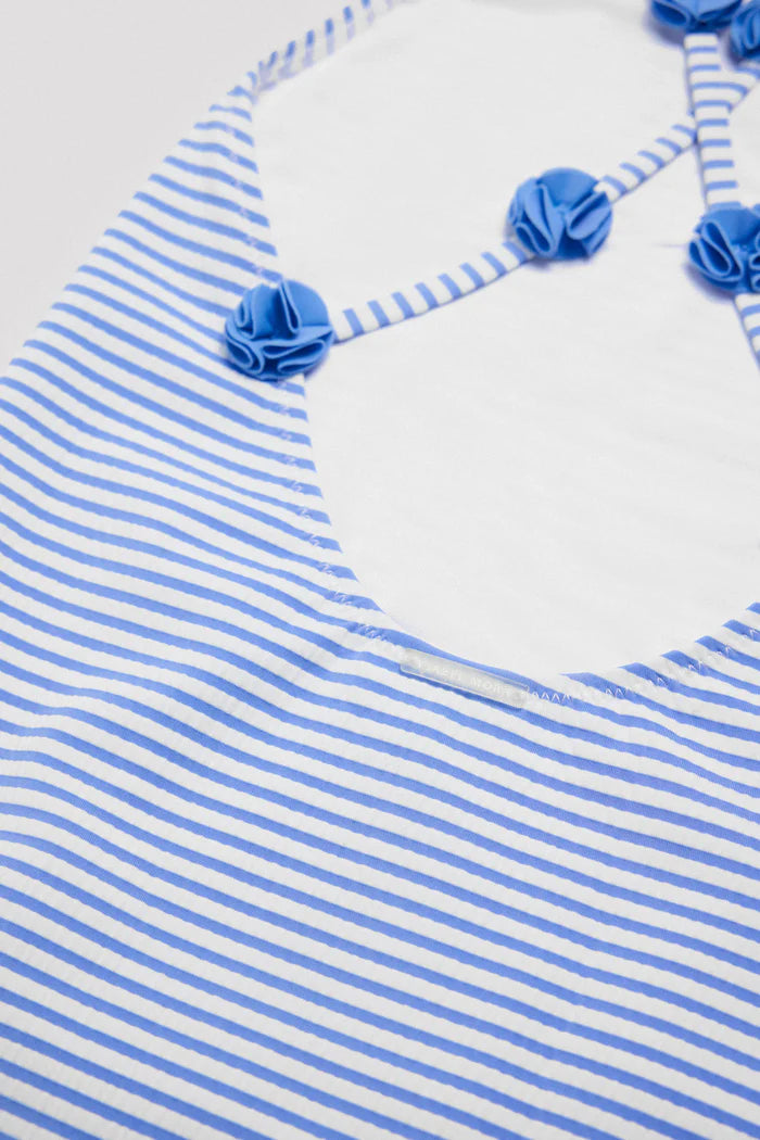 Fato de banho de menina com estampado e textura às riscas azuis